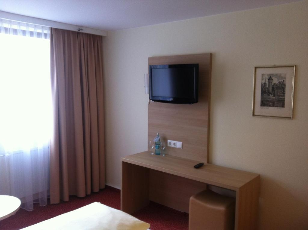 Tauberhotel Kette Вертгейм Номер фото